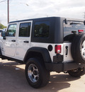jeep wrangler unlimited 2010 white suv sport gasoline 6 cylinders 4 wheel drive automatic 77515