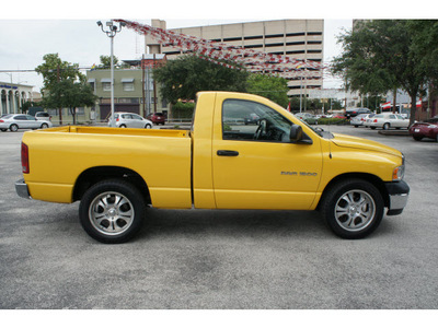 dodge ram pickup 1500 2004 yellow pickup truck st gasoline 8 cylinders rear wheel drive automatic 78205