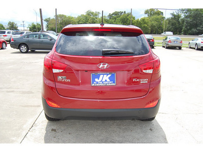 hyundai tucson 2012 dk  red limited gasoline 4 cylinders front wheel drive automatic with overdrive 77627