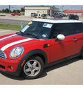 mini cooper 2010 red hatchback gasoline 4 cylinders front wheel drive 6 speed manual 76502