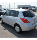 nissan versa 2010 silver hatchback gasoline 4 cylinders front wheel drive automatic with overdrive 76087