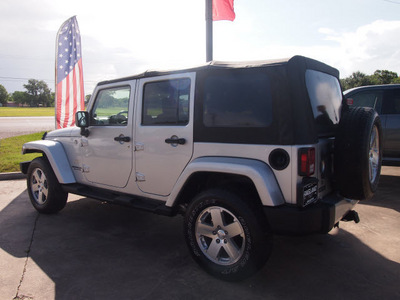 jeep wrangler unlimited 2008 silver suv sahara gasoline 6 cylinders 4 wheel drive automatic 77515