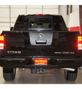 nissan titan 2010 black pro 4x flex fuel 8 cylinders 4 wheel drive automatic 79110