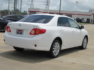 toyota corolla 2010 white sedan xle gasoline 4 cylinders front wheel drive automatic with overdrive 77469