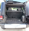 jeep wrangler unlimited 2009 black suv sahara gasoline 6 cylinders 4 wheel drive automatic 13502