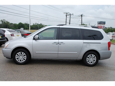 kia sedona 2011 silver van lx gasoline 6 cylinders front wheel drive automatic with overdrive 77802