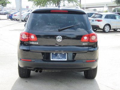 volkswagen tiguan 2011 black suv se gasoline 4 cylinders front wheel drive shiftable automatic 77074