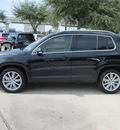 volkswagen tiguan 2011 black suv se gasoline 4 cylinders front wheel drive shiftable automatic 77074