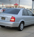 mazda protege 1999 silver sedan lx gasoline 4 cylinders front wheel drive automatic with overdrive 77074