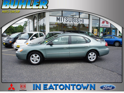 ford taurus 2006 light tundra sedan se gasoline 6 cylinders front wheel drive automatic 07724