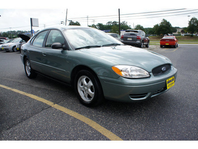 ford taurus 2006 light tundra sedan se gasoline 6 cylinders front wheel drive automatic 07724