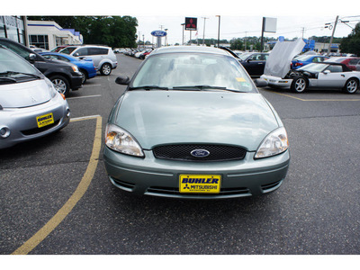 ford taurus 2006 light tundra sedan se gasoline 6 cylinders front wheel drive automatic 07724