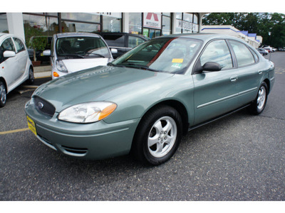 ford taurus 2006 light tundra sedan se gasoline 6 cylinders front wheel drive automatic 07724