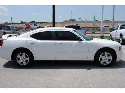 dodge charger 2007 white sedan gasoline 6 cylinders rear wheel drive automatic 77037