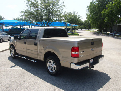 ford f 150 2008 gold xlt gasoline 8 cylinders 2 wheel drive automatic 76049