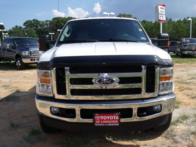 ford f 250 super duty 2010 white lariat fx4 8 cylinders automatic 75604