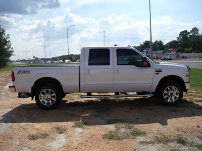 ford f 250 super duty 2010 white lariat fx4 8 cylinders automatic 75604