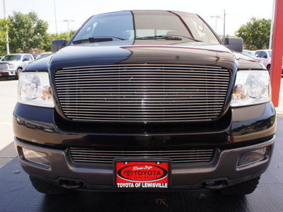 ford f 150 2004 black fx4 gasoline 8 cylinders 4 wheel drive automatic with overdrive 75067