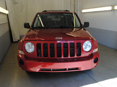 jeep patriot 2008 red suv sport gasoline 4 cylinders 4 wheel drive 5 speed manual 44060