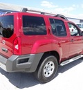 nissan xterra 2010 dk  red suv gasoline 6 cylinders 2 wheel drive automatic 77388
