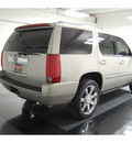 cadillac escalade 2007 gold suv gasoline 8 cylinders all whee drive automatic with overdrive 77630