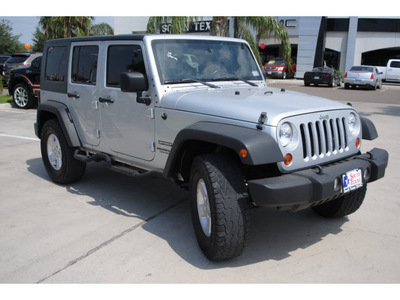 jeep wrangler unlimited 2010 silver suv sport gasoline 6 cylinders 4 wheel drive automatic 78502