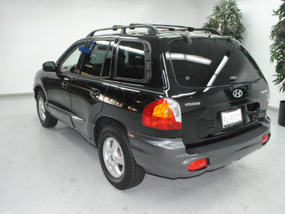 hyundai santa fe 2004 black suv gls gasoline 6 cylinders front wheel drive automatic 91731