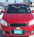 chevrolet aveo 2009 red hatchback aveo5 lt gasoline 4 cylinders front wheel drive automatic 77304