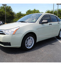 ford focus 2010 green sedan se gasoline 4 cylinders front wheel drive automatic with overdrive 77581