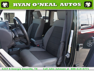 jeep wrangler unlimited 2010 green suv sport gasoline 6 cylinders 4 wheel drive automatic 79110