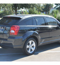dodge caliber 2010 black hatchback sxt gasoline 4 cylinders front wheel drive automatic with overdrive 77074