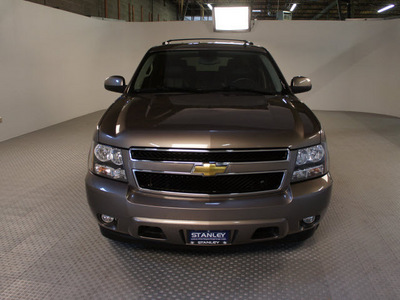 chevrolet tahoe 2011 brown suv lt flex fuel 8 cylinders 2 wheel drive automatic 75219