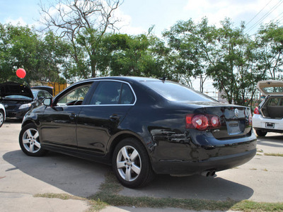 volkswagen jetta 2009 black sedan se gasoline 5 cylinders front wheel drive automatic 78520