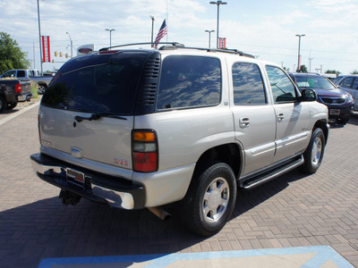 gmc yukon 2005 pewter suv slt gasoline 8 cylinders 4 wheel drive automatic 76087