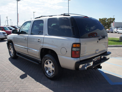 gmc yukon 2005 pewter suv slt gasoline 8 cylinders 4 wheel drive automatic 76087