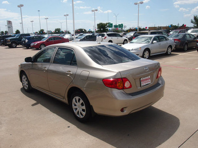 toyota corolla 2010 tan sedan le gasoline 4 cylinders front wheel drive automatic 76053