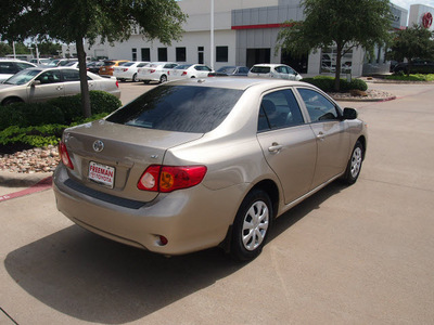 toyota corolla 2010 tan sedan le gasoline 4 cylinders front wheel drive automatic 76053