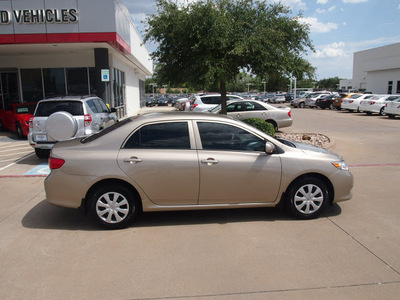 toyota corolla 2010 tan sedan le gasoline 4 cylinders front wheel drive automatic 76053