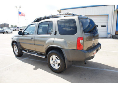 nissan xterra 2002 gold suv gasoline 6 cylinders rear wheel drive automatic 77034