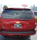 chevrolet suburban 2012 red suv flex fuel 8 cylinders 2 wheel drive automatic 33177