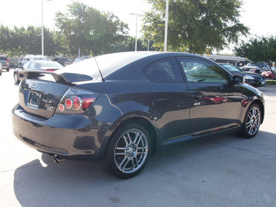 scion tc 2009 dk  gray coupe gasoline 4 cylinders front wheel drive 5 speed manual 76011