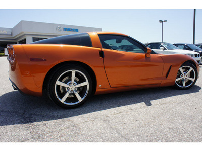 chevrolet corvette 2009 orange coupe gasoline 8 cylinders rear wheel drive 6 speed manual 76505
