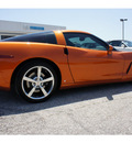 chevrolet corvette 2009 orange coupe gasoline 8 cylinders rear wheel drive 6 speed manual 76505