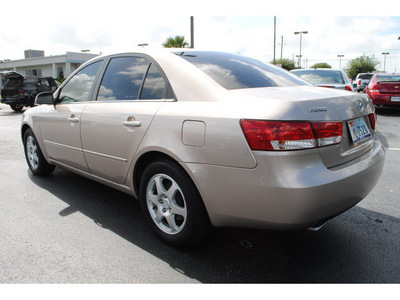 hyundai sonata 2006 beige sedan gasoline 6 cylinders front wheel drive automatic with overdrive 77581