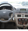 hyundai sonata 2006 beige sedan gasoline 6 cylinders front wheel drive automatic with overdrive 77581