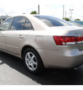 hyundai sonata 2006 beige sedan gasoline 6 cylinders front wheel drive automatic with overdrive 77581