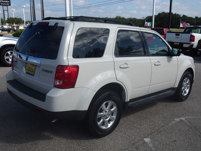 mazda tribute 2009 off white suv i grand touring gasoline 4 cylinders front wheel drive automatic 77802