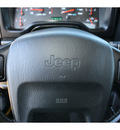 jeep wrangler 2004 yellow suv x gasoline 6 cylinders 4 wheel drive automatic 98632