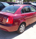 hyundai accent 2009 dk  red sedan gls gasoline 4 cylinders front wheel drive automatic 77845