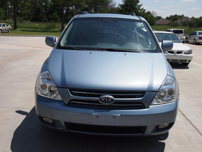 kia sedona 2010 blue van ex gasoline 6 cylinders front wheel drive automatic 77375